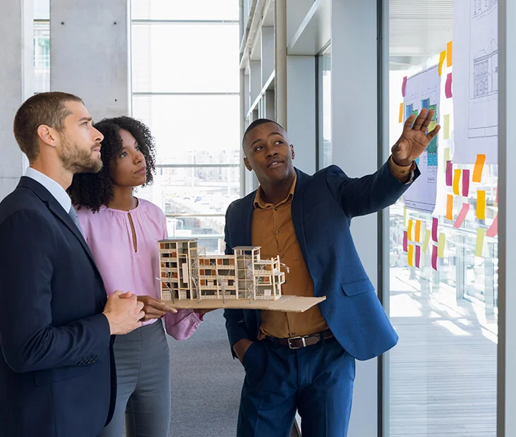 building-model-people-meeting investment solutions