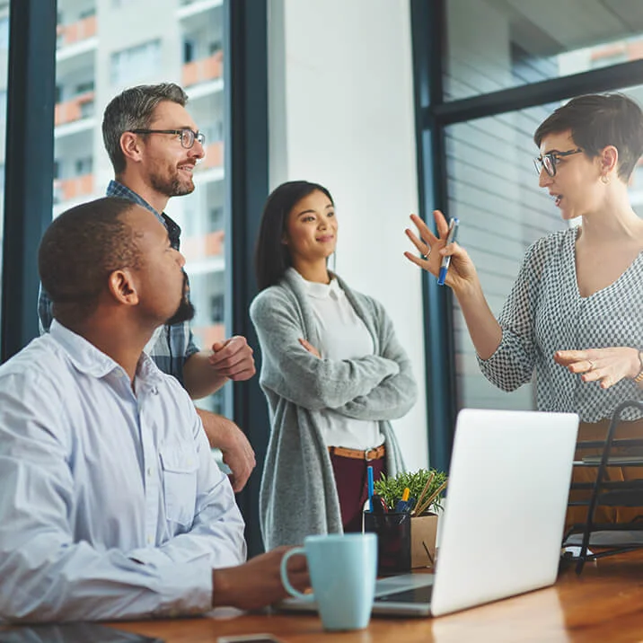 woman-talking-meeting-laptop partnering